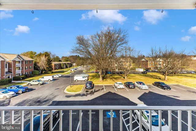 a bathroom with a glass shower door and a mirror