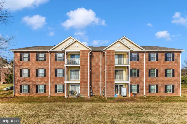 a front view of a house with a porch