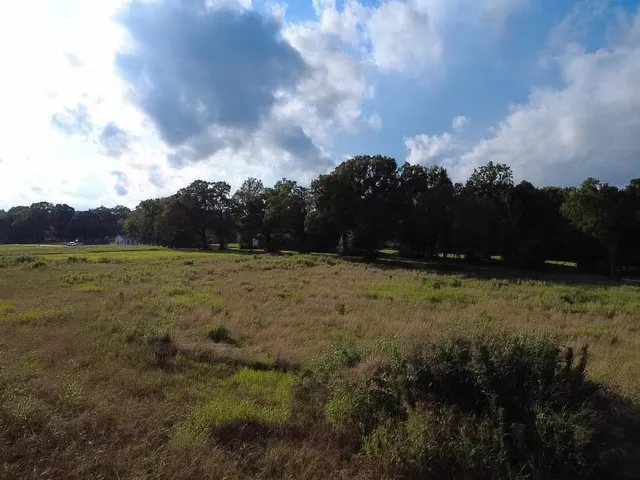 a view of swimming pool and mountain in the back