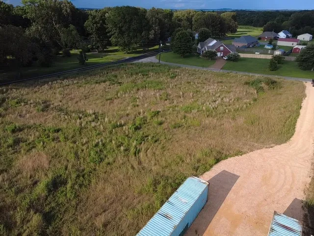 a view of a yard with an outdoor space