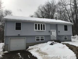380 Hop River Road Coventry, CT 06238 - Photo 1 of 1 a front view of a house with a yard