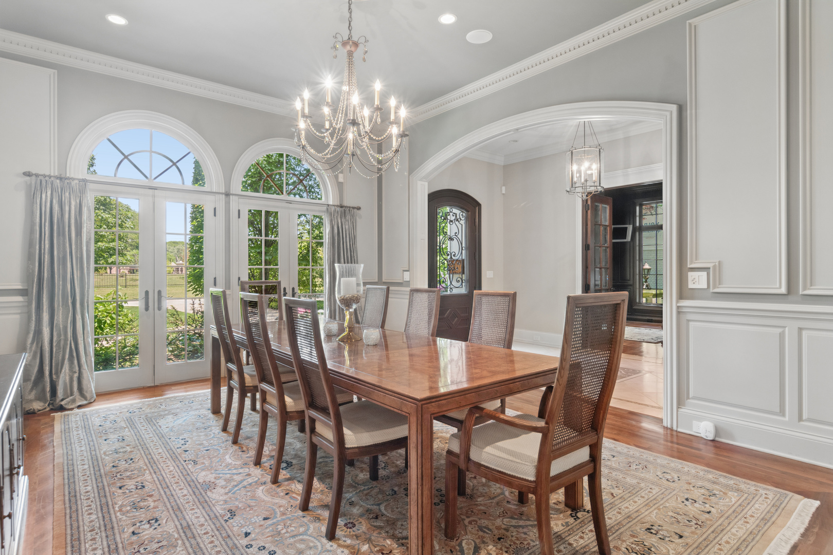 1128 Mt Pleasant Road Winnetka, IL 60093 - Photo 6 of 58 a view of a dining room with furniture a chandelier and wooden floor