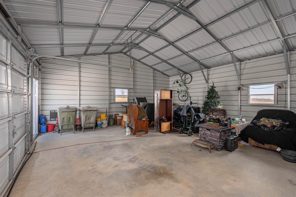 3028 Harrell Road Howe, TX 75459 - Photo 28 of 39 a view of a garage with storage