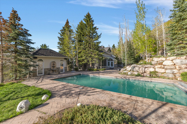 3222 Eagle View Circle Sandy, UT 84092 - Photo 43 of 60 Outdoor pool featuring a patio