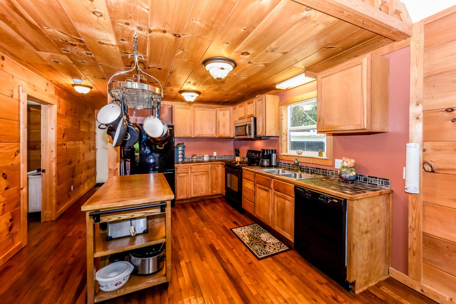 3356 Montevallo Road Sevierville, TN 37876 - Photo 4 of 26 a kitchen with stainless steel appliances granite countertop a stove and a sink