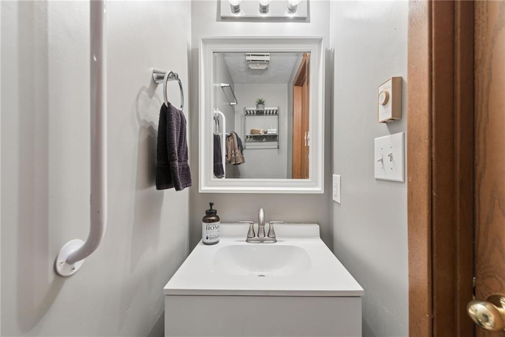 1223 Veech Lane Hidden Valley, PA 15502 - Photo 12 of 30 a bathroom with a sink and a mirror