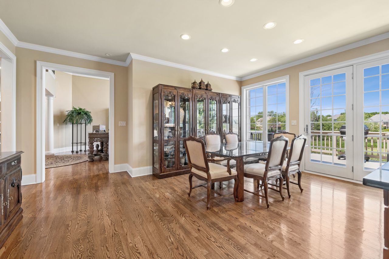 1029 Ridgeview Drive Inverness, IL 60010 - Photo 19 of 58 a view of a dining room with furniture and wooden floor