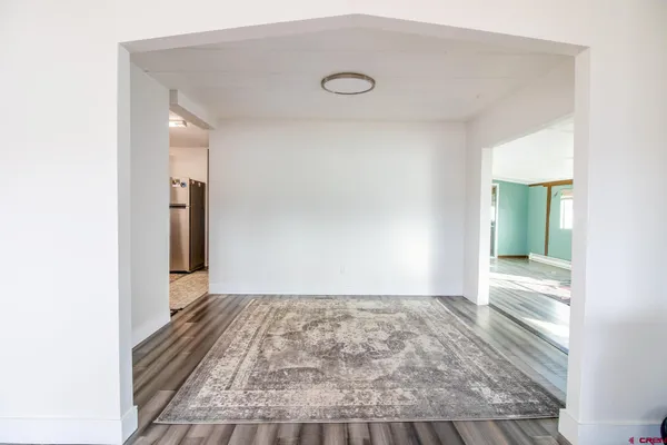a kitchen with a sink appliances and cabinets