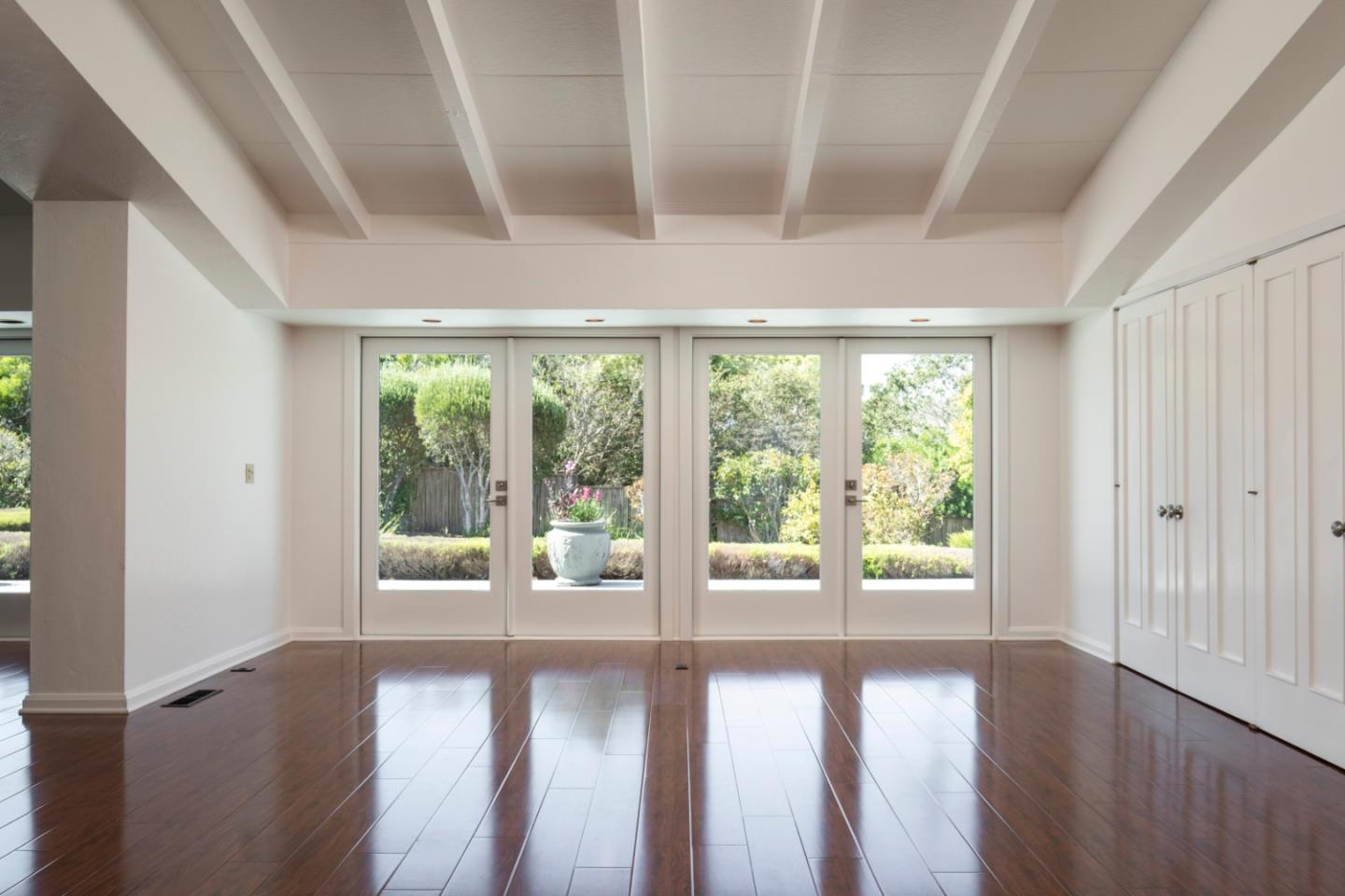 1604 Viscaino Road Pebble Beach, CA 93953 - Photo 6 of 25 a view of empty room with wooden floor and fan