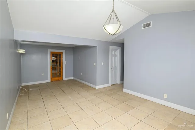 an empty room with fan