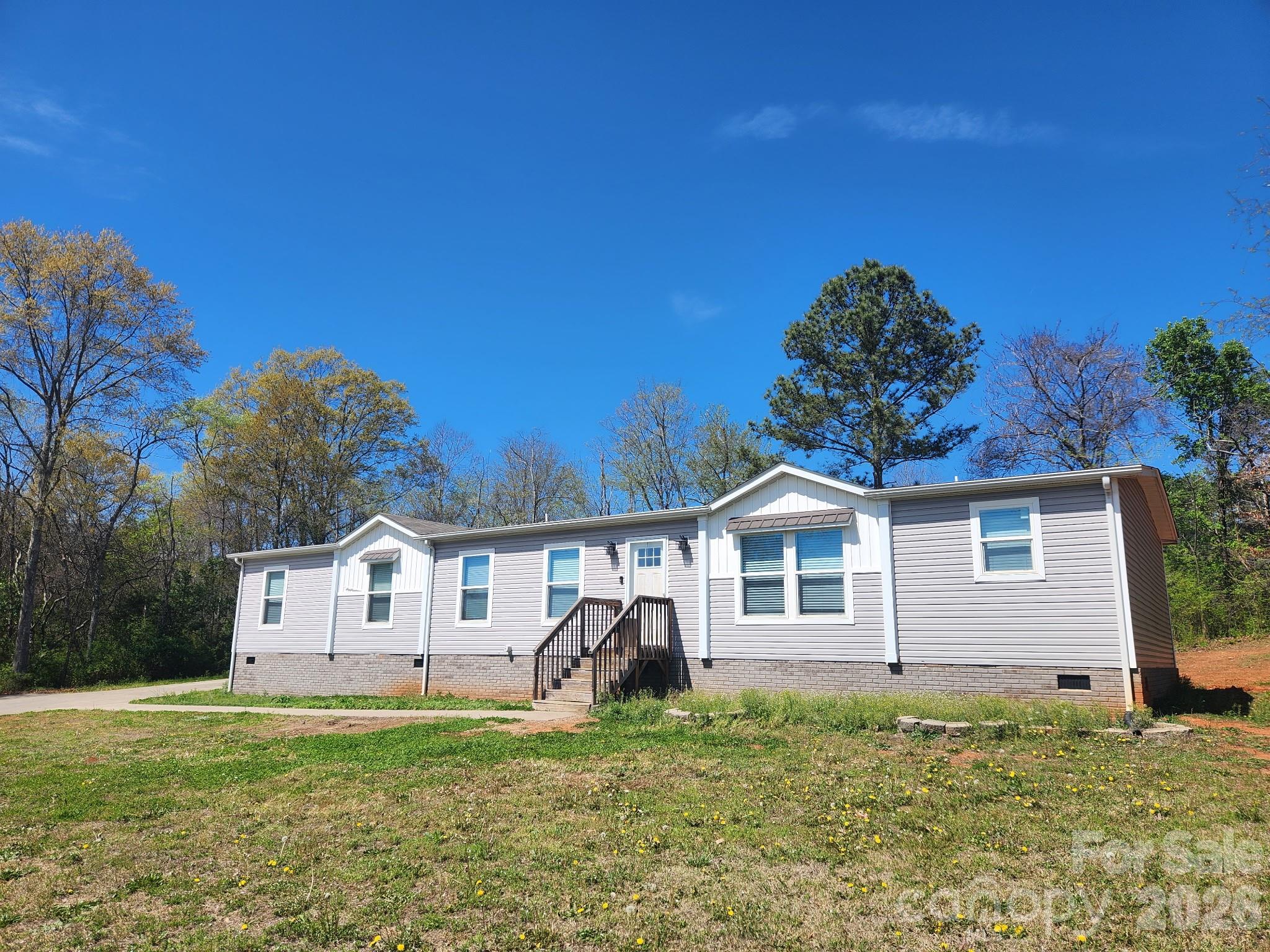 3022 West Zion Church Road Shelby, NC 28150 - Photo 1 of 1 a front view of a house with a yard