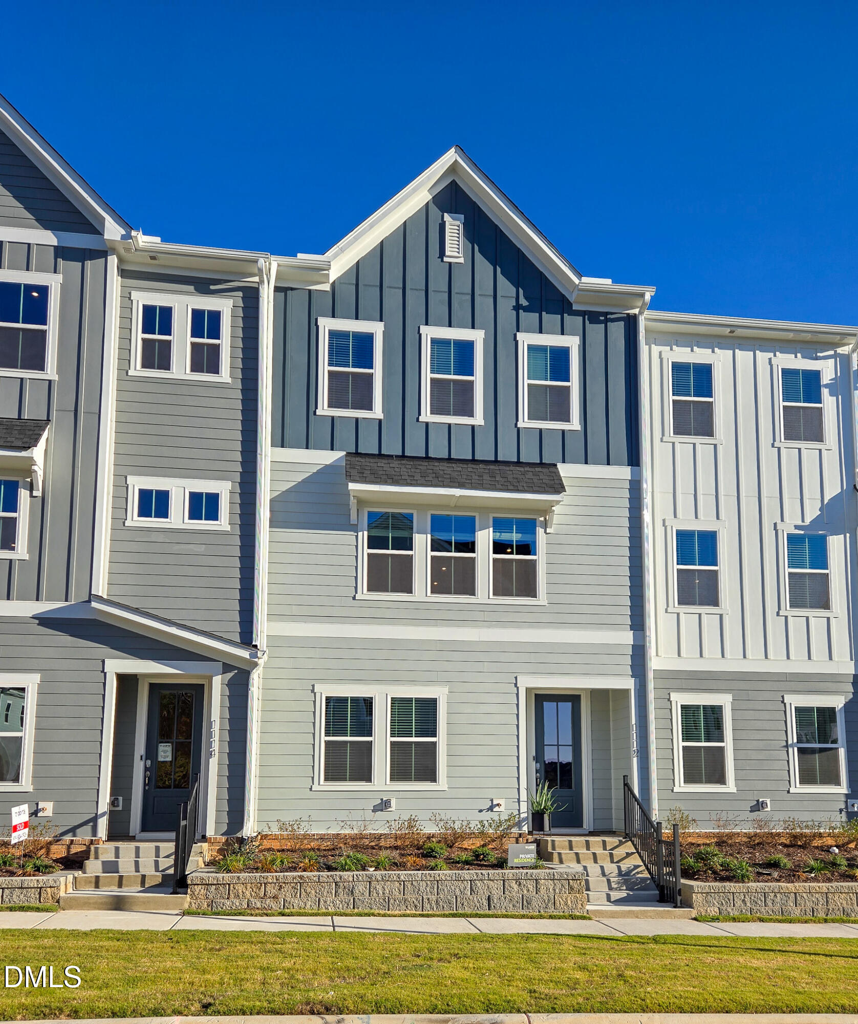 1112 Holding Village Way Wake Forest, NC 27587 - Photo 2 of 45 a front view of a building with a swimming pool
