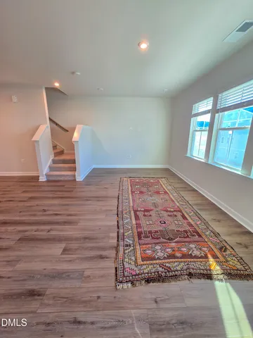a view of a hallway with an entryway