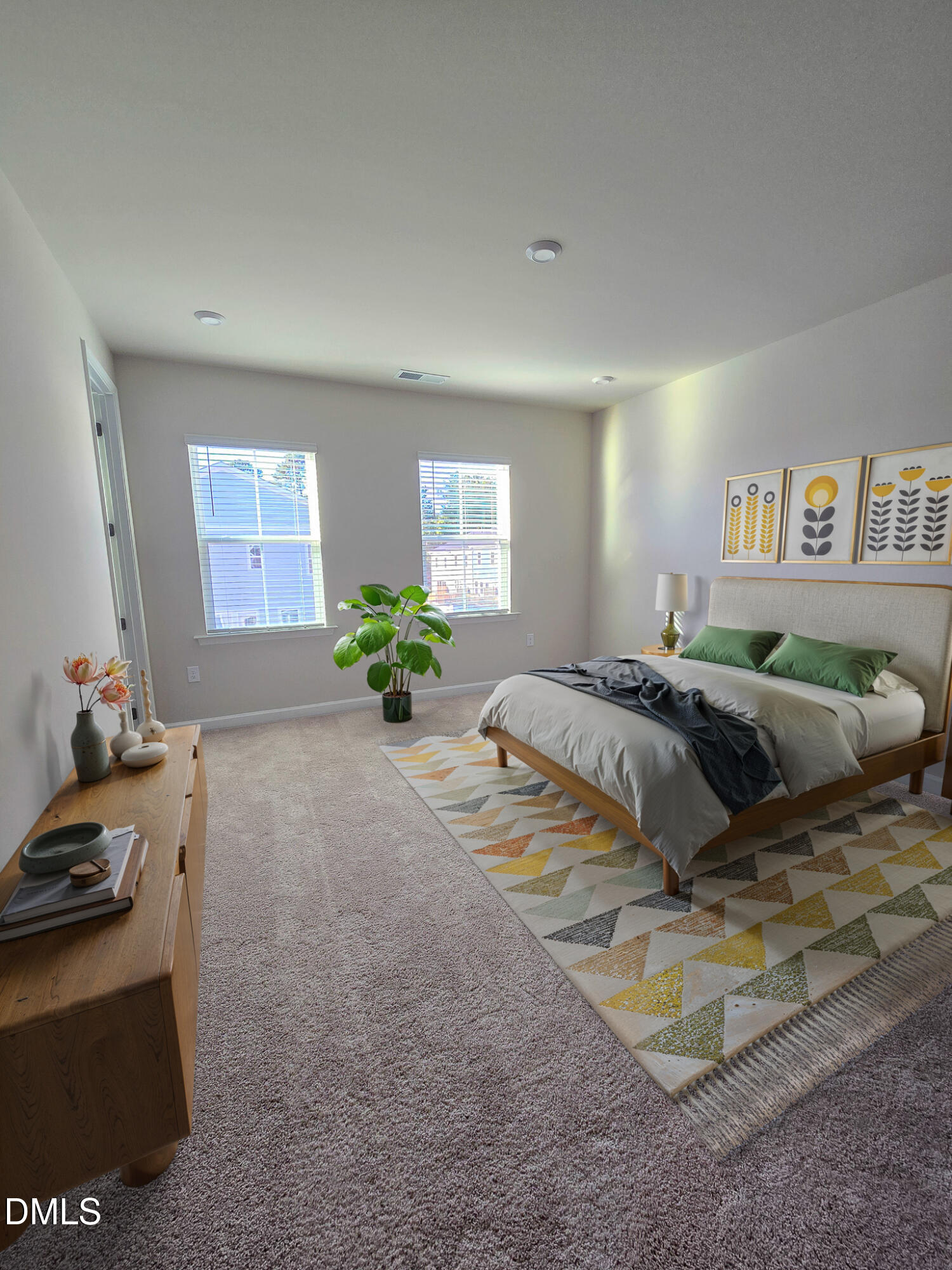 1112 Holding Village Way Wake Forest, NC 27587 - Photo 23 of 45 a bedroom with a bed and a couch