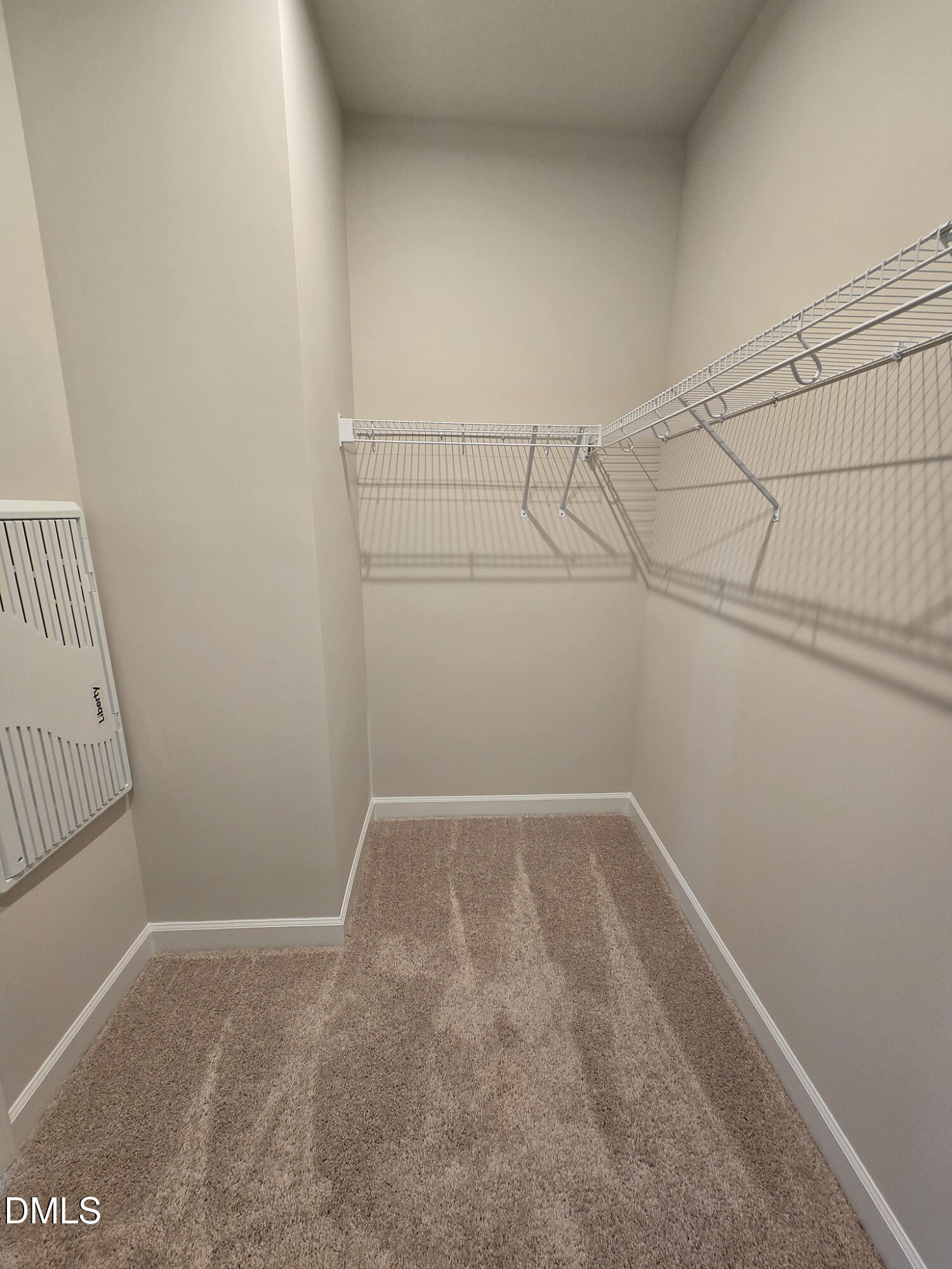 1112 Holding Village Way Wake Forest, NC 27587 - Photo 27 of 45 a view of a room with racks on the wall