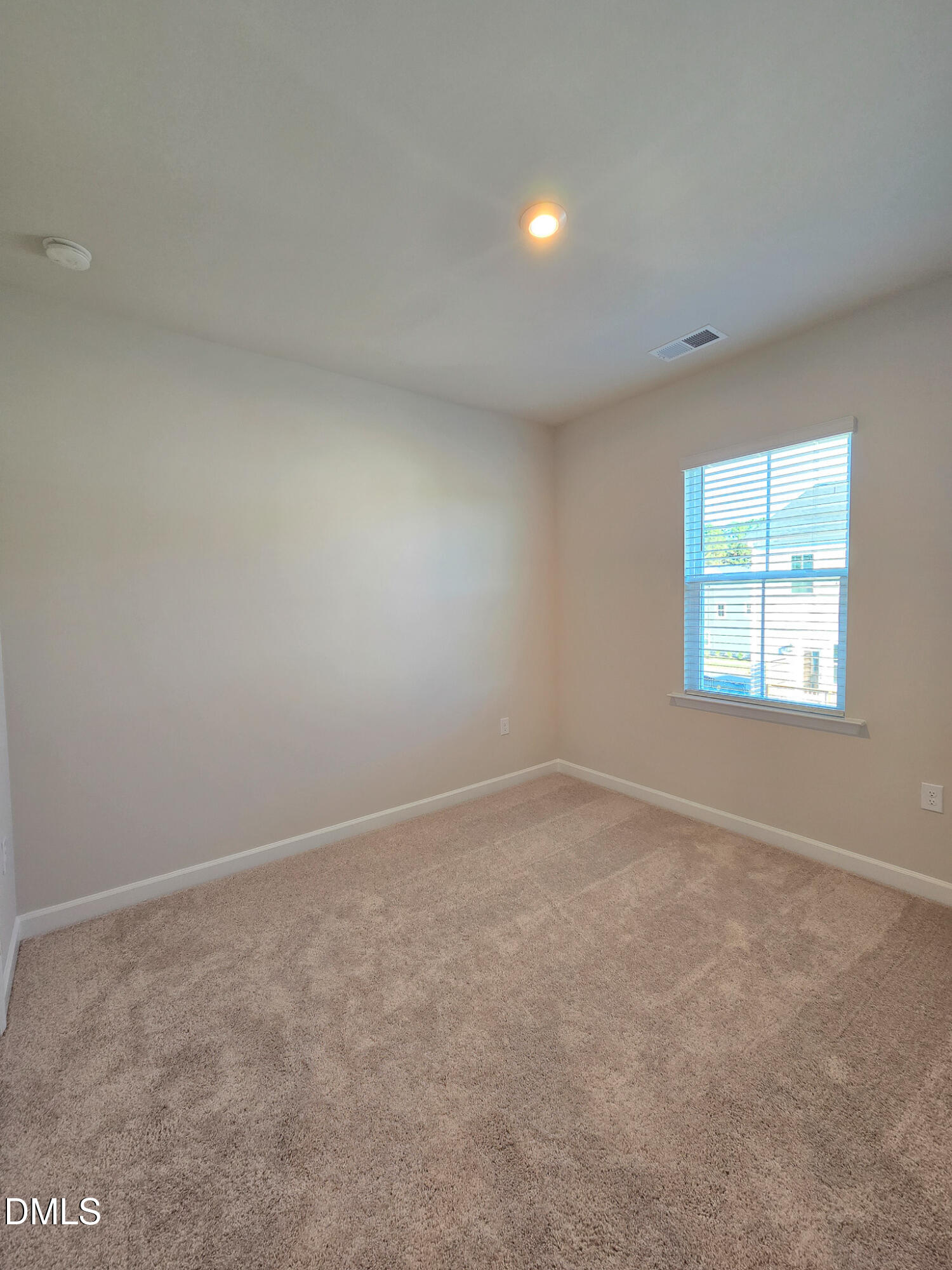1112 Holding Village Way Wake Forest, NC 27587 - Photo 31 of 45 an empty room with a window