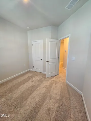 an empty room with a natural light