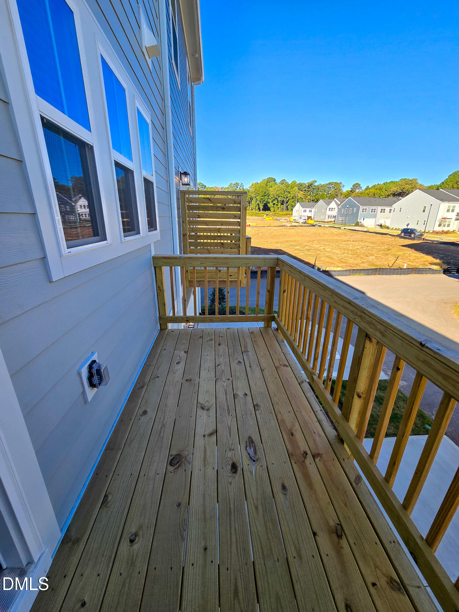 1112 Holding Village Way Wake Forest, NC 27587 - Photo 43 of 45 a view of roof deck with wooden floor and city view
