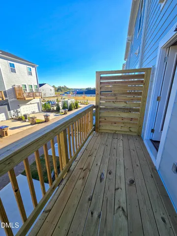 a view of balcony with furniture