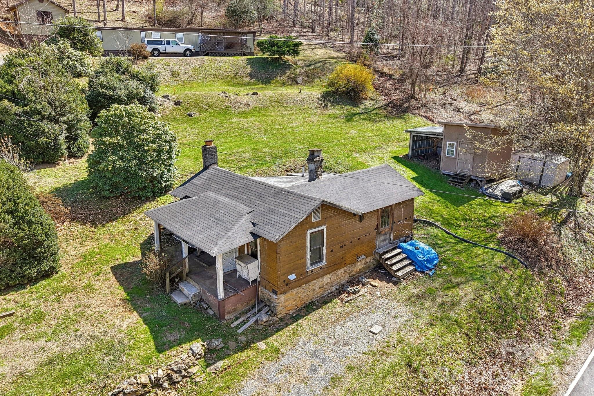 719 Camp Branch Road Waynesville, NC 28786 - Photo 6 of 22 a view of a house with a yard