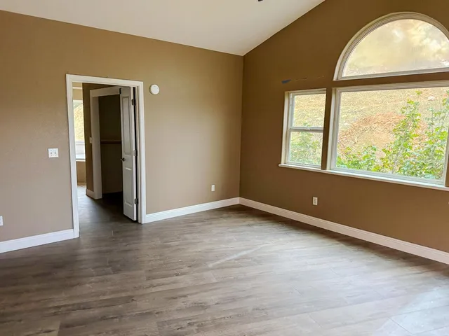 a bathroom with a tub and a shower