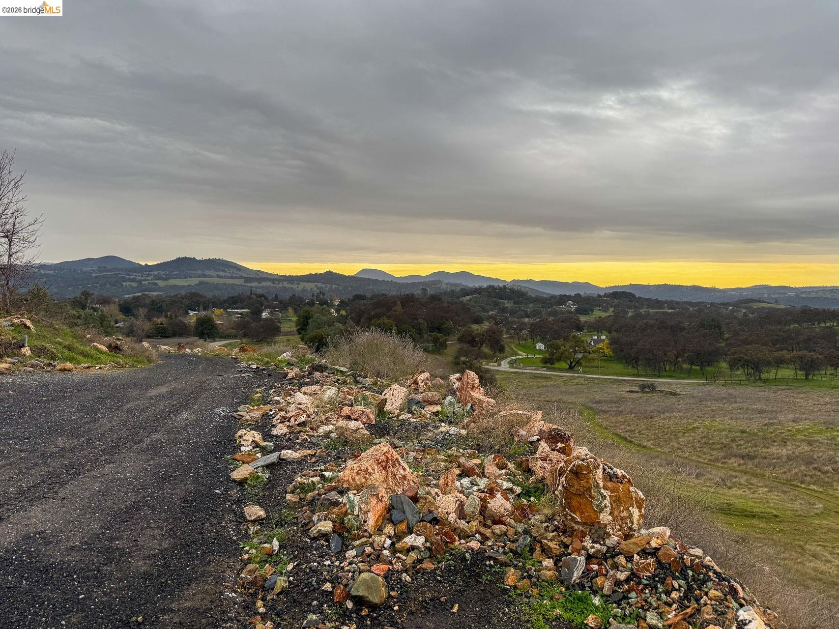 16446 Stamp Mill Loop Road East Jamestown, CA 95327 - Photo 2 of 32 a view of an outdoor space and mountain view