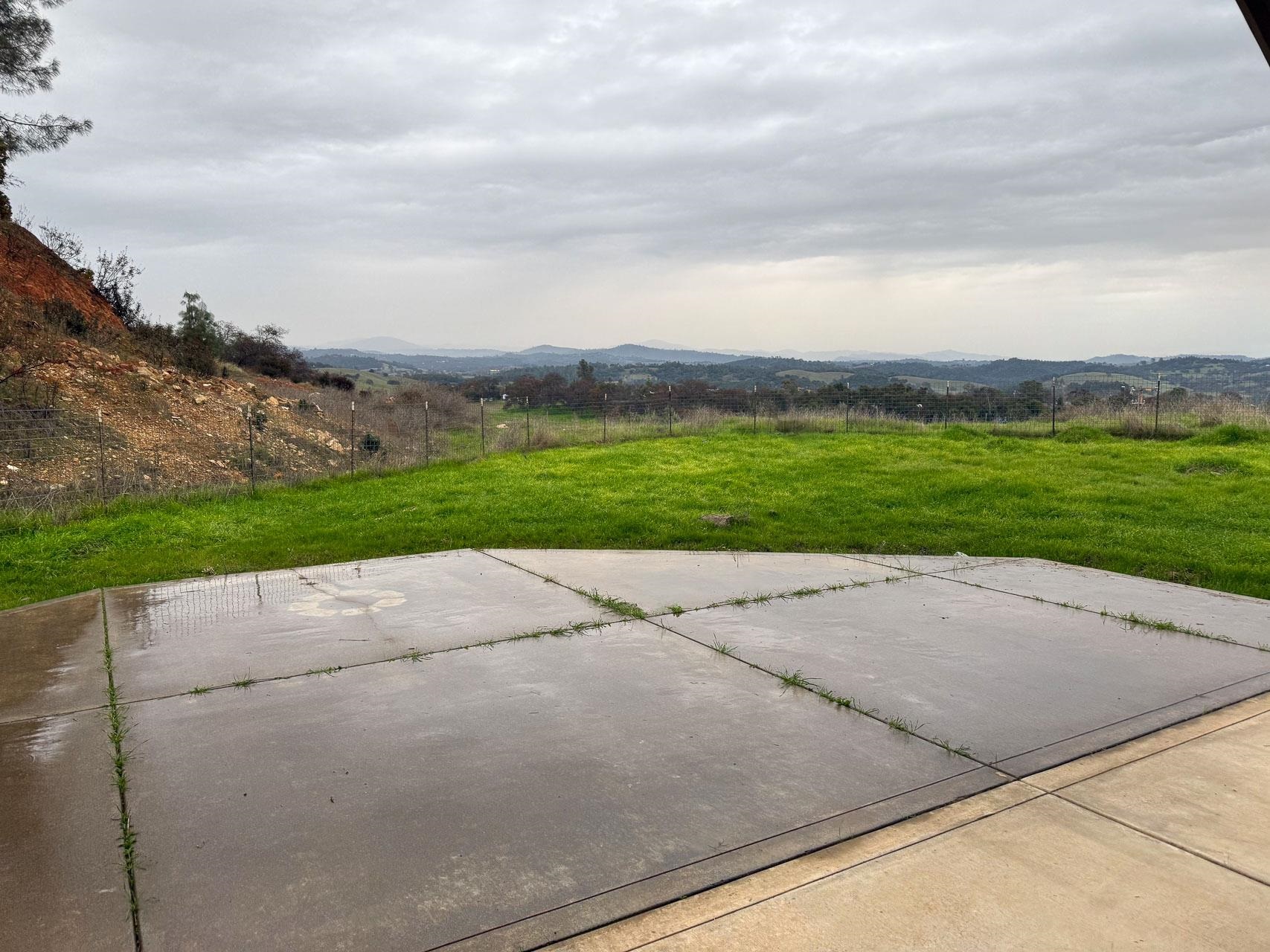 16446 Stamp Mill Loop Road East Jamestown, CA 95327 - Photo 32 of 32 a view of a street with a big yard of front a house