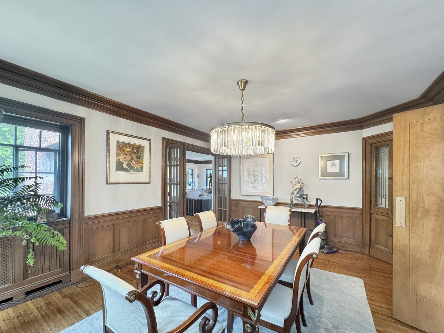 6909 South Chappel Avenue Chicago, IL 60649 - Photo 26 of 60 a view of a dining room with furniture window and wooden floor