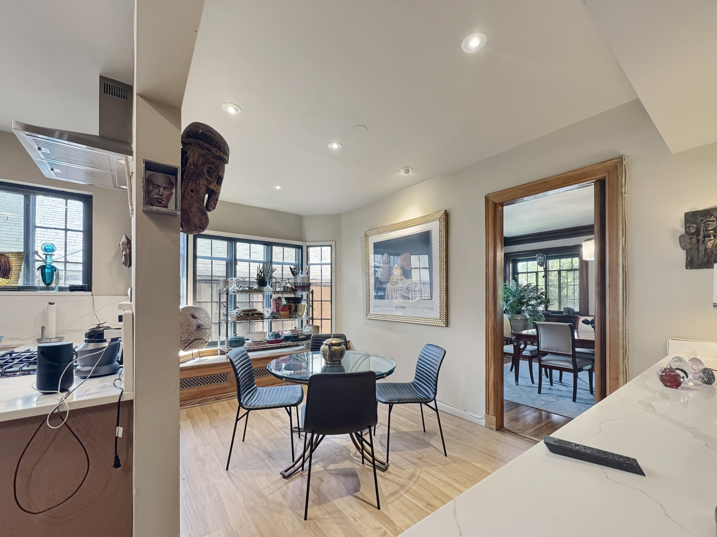 6909 South Chappel Avenue Chicago, IL 60649 - Photo 28 of 60 a living room with furniture a window and stainless steel appliances