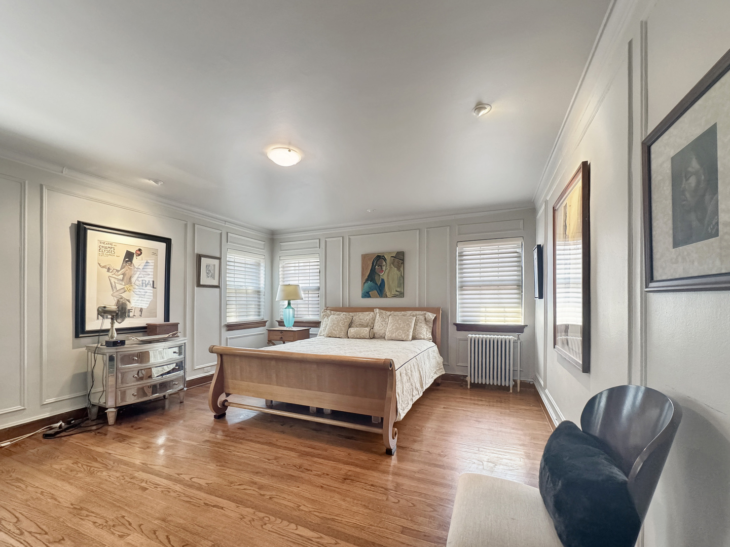 6909 South Chappel Avenue Chicago, IL 60649 - Photo 33 of 60 a bedroom with a bed couch and windows
