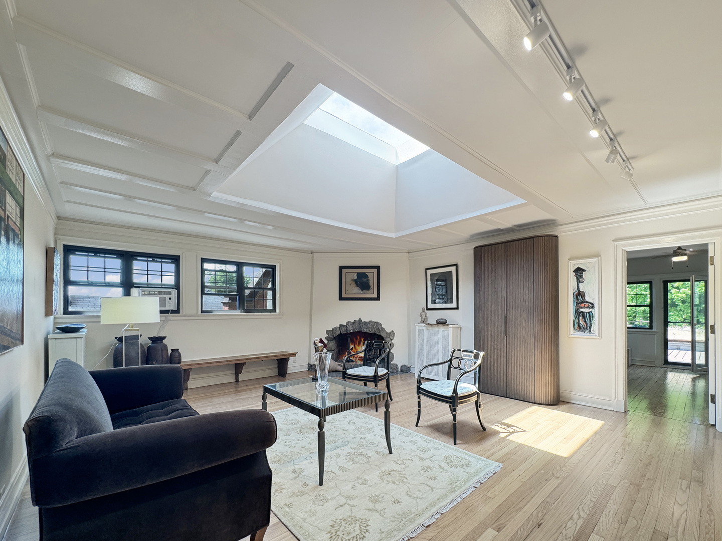 6909 South Chappel Avenue Chicago, IL 60649 - Photo 37 of 60 a living room with furniture and a wooden floor