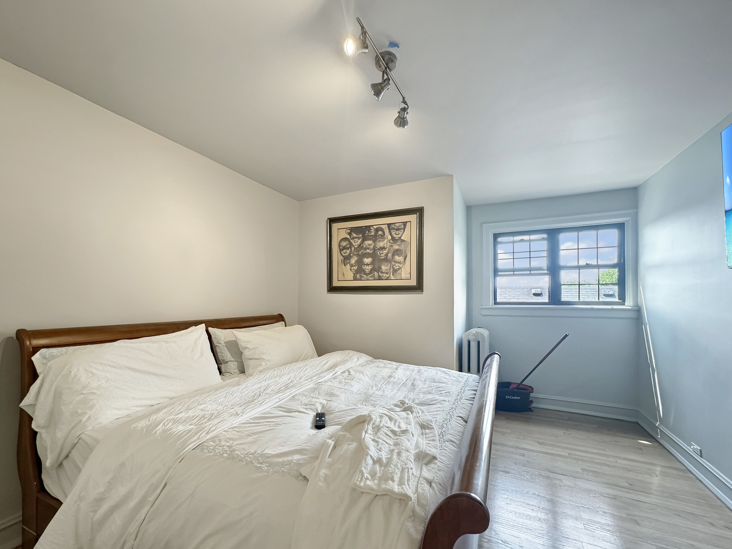 6909 South Chappel Avenue Chicago, IL 60649 - Photo 43 of 60 a bedroom with a large bed and a window