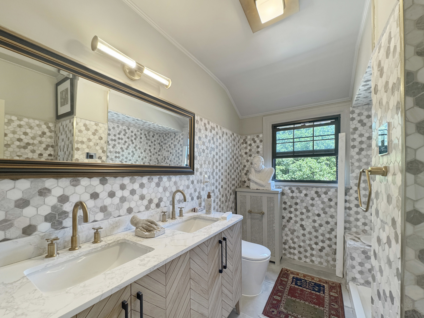 6909 South Chappel Avenue Chicago, IL 60649 - Photo 45 of 60 a bathroom with a sink a toilet and shower