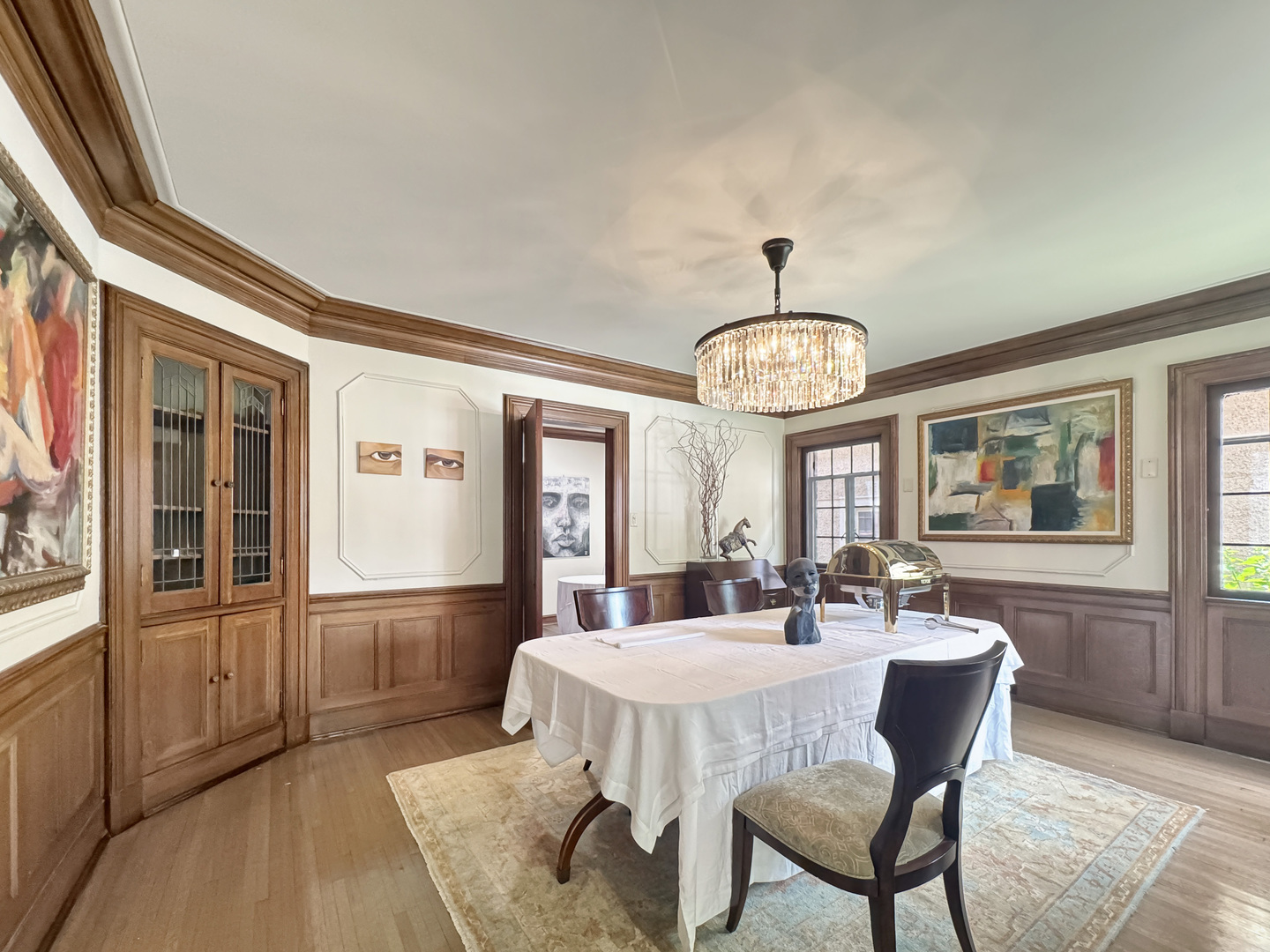 6909 South Chappel Avenue Chicago, IL 60649 - Photo 6 of 60 a view of a dining room with furniture window and wooden floor