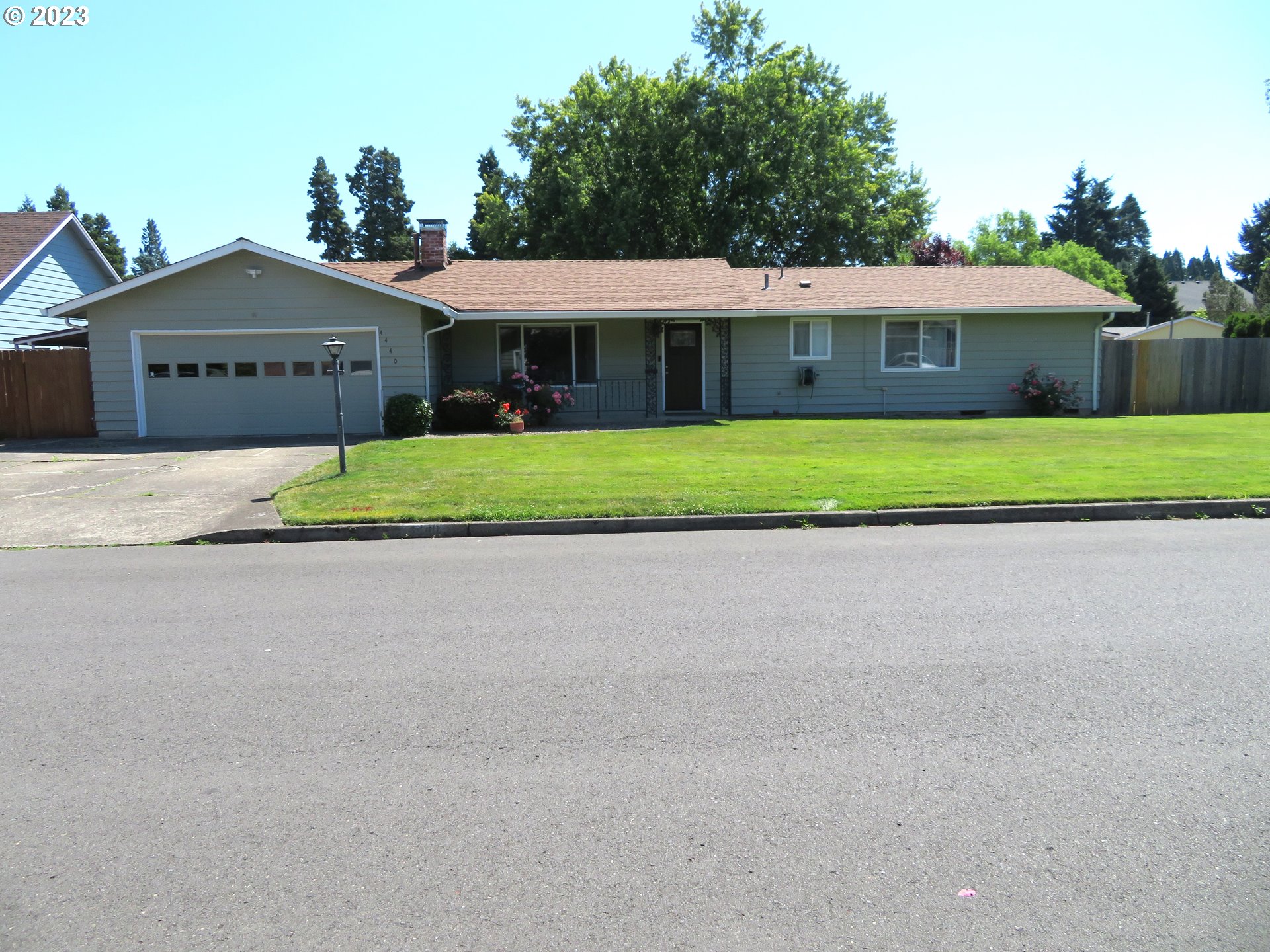 4440 Southwest 194th Court Beaverton, OR 97078 - Photo 1 of 32 a front view of a house with a yard
