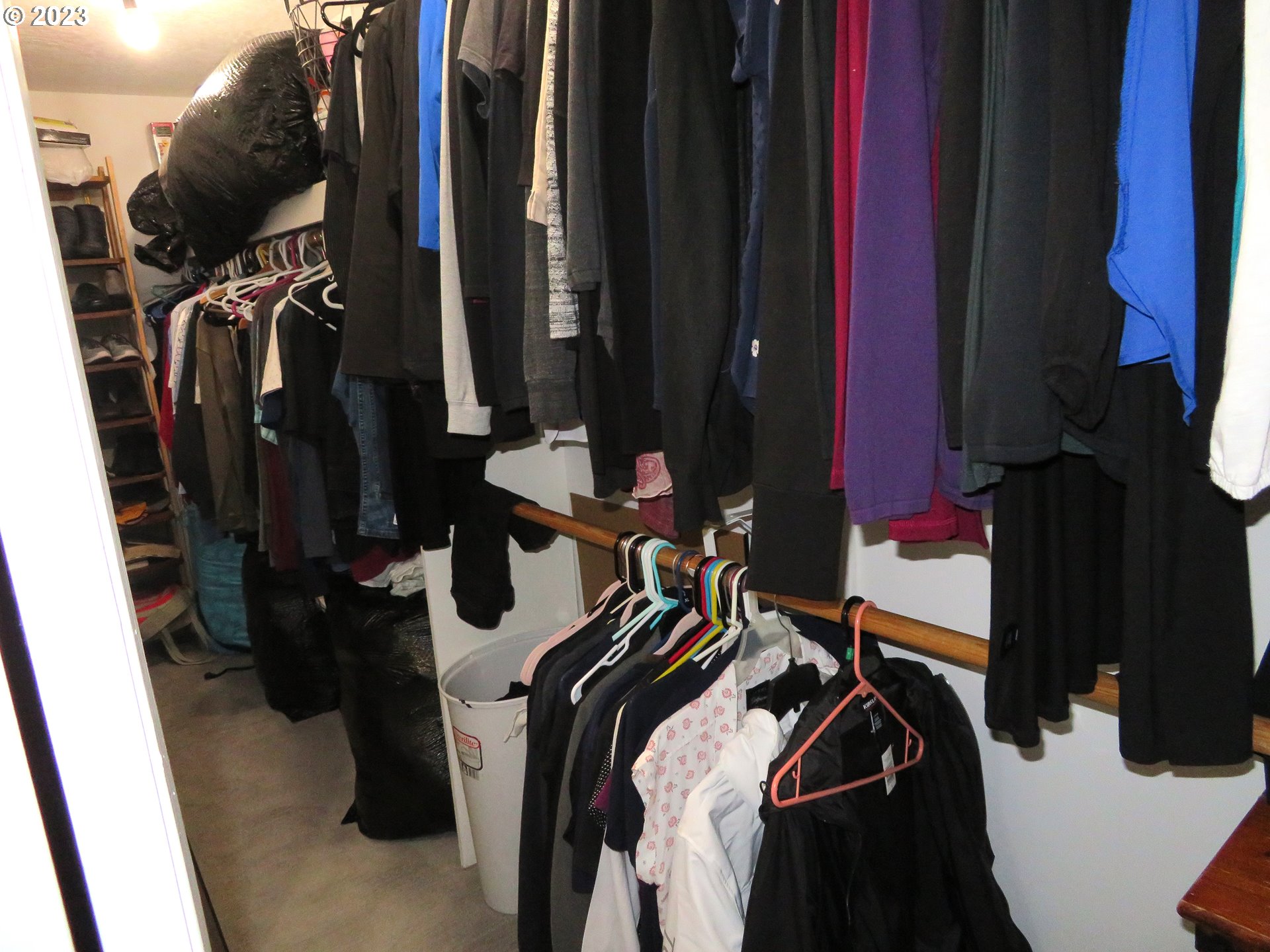 4440 Southwest 194th Court Beaverton, OR 97078 - Photo 25 of 32 a view of walk in closet with clothes and shoes