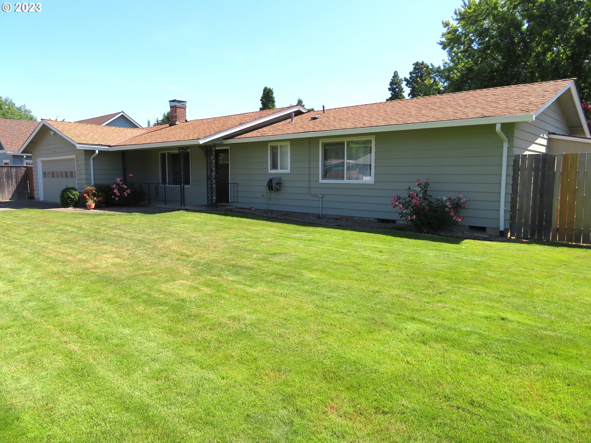 4440 Southwest 194th Court Beaverton, OR 97078 - Photo 5 of 32 a view of a house with a yard and sitting area