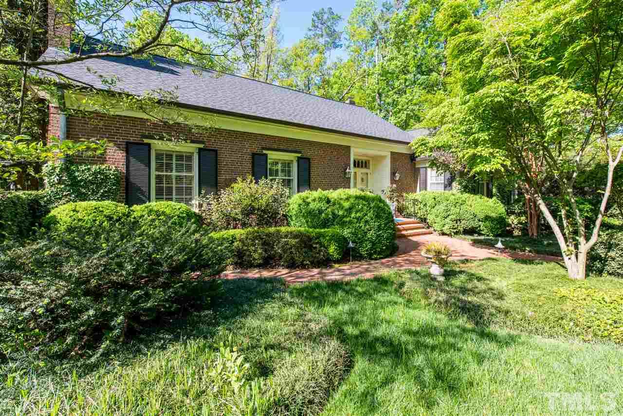 2503 Wake Drive Raleigh, NC 27608 - Photo 2 of 24 a view of a house with garden and yard