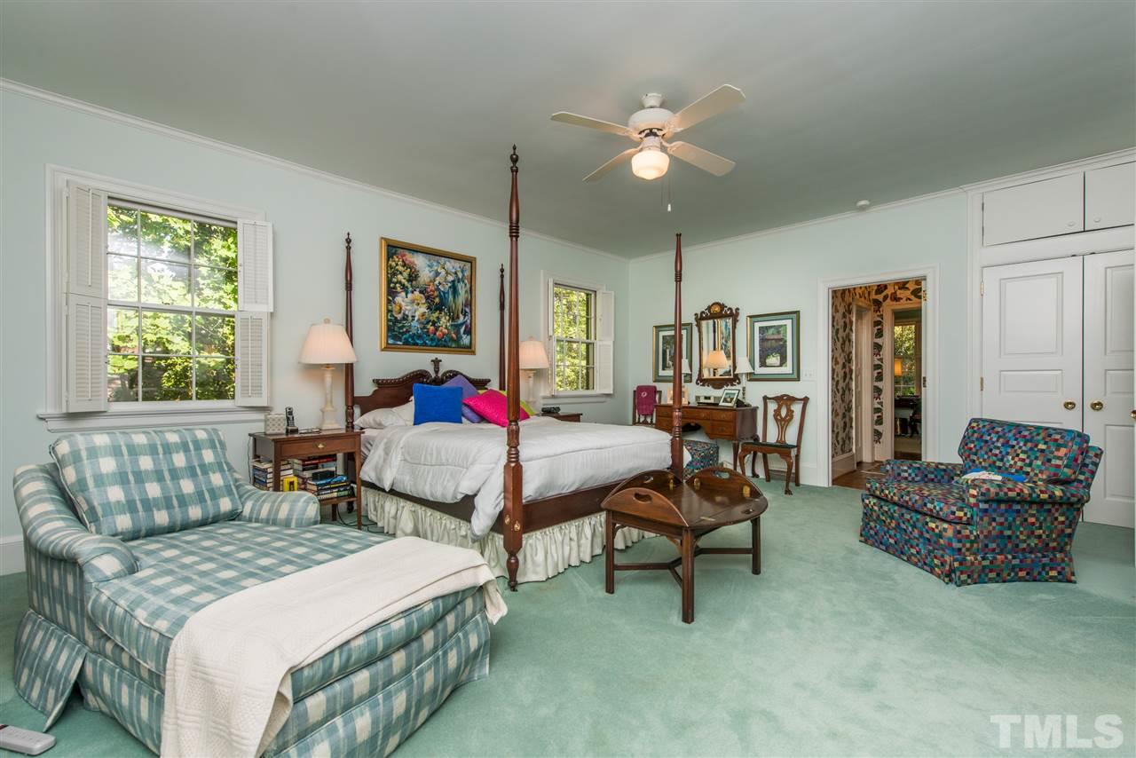 2503 Wake Drive Raleigh, NC 27608 - Photo 11 of 24 a bedroom with a bed and furniture