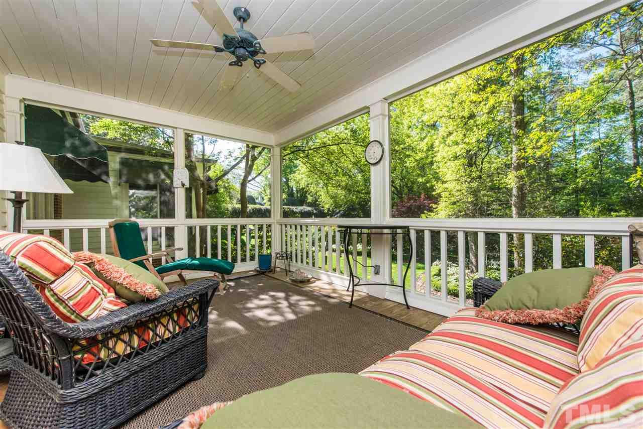 2503 Wake Drive Raleigh, NC 27608 - Photo 15 of 24 a balcony with furniture and a garden