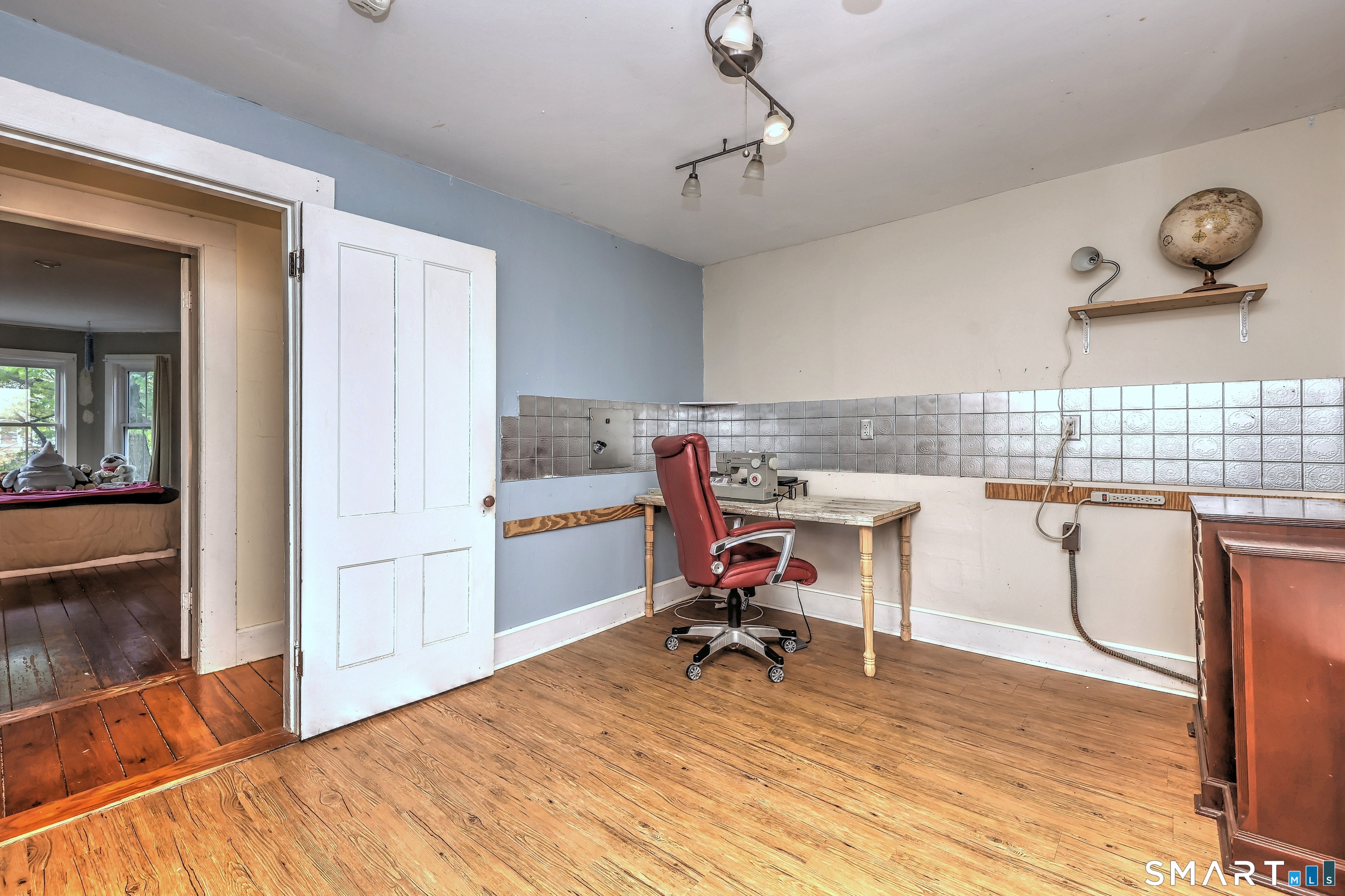 186 Jones Hill Road West Haven, CT 06516 - Photo 26 of 33 a view of a kitchen and a dining room