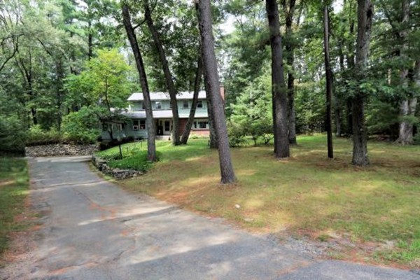 12 3 Ponds Road Wayland, MA 01778 - Photo 3 of 26 a view of a tree in a yard