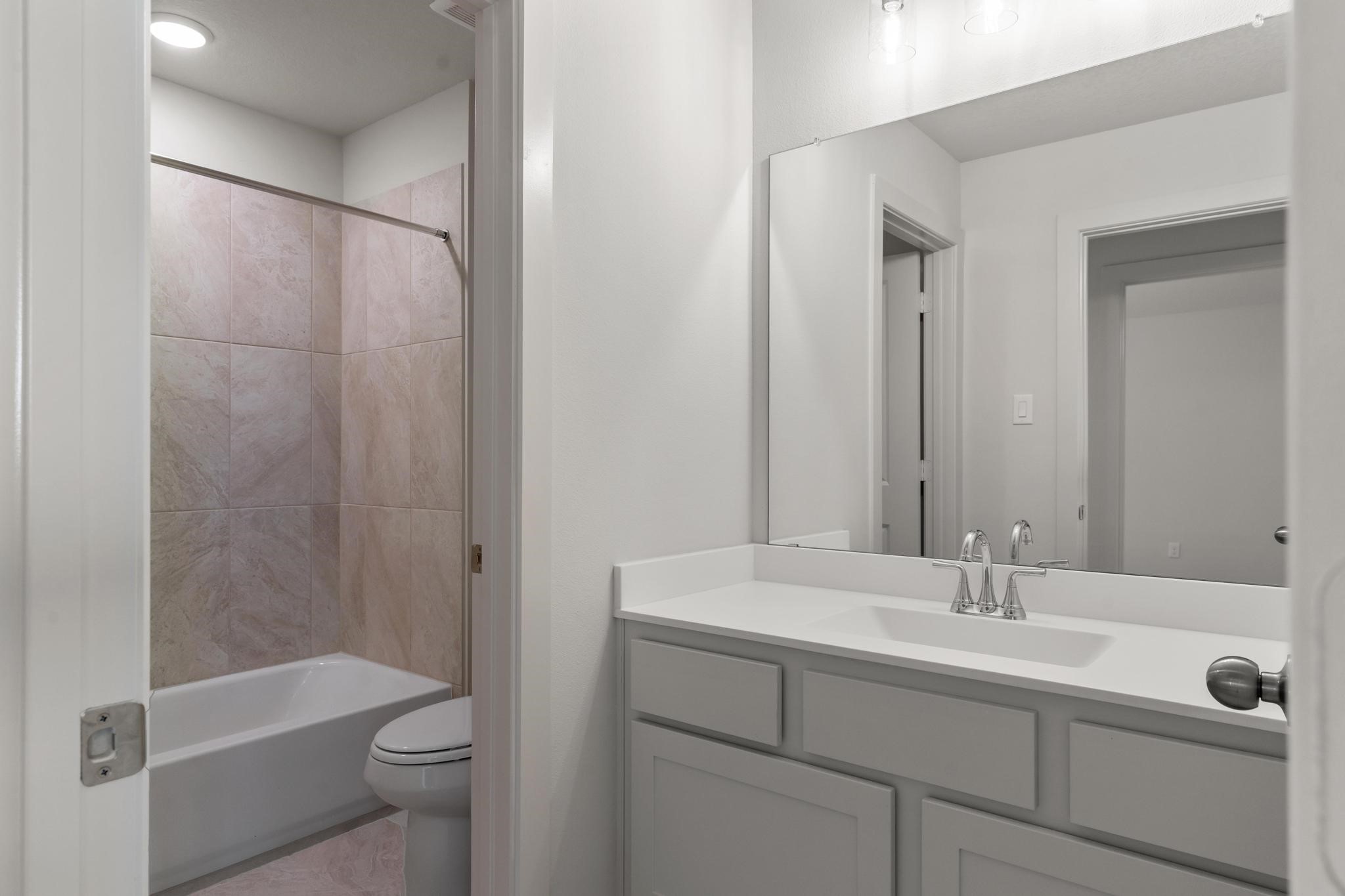 407 Mathis Lk Court Conroe, TX 77304 - Photo 18 of 26 Upstairs Full Bathroom #3