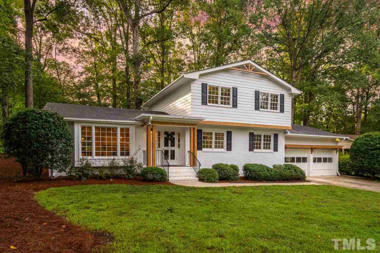 4012 Colby Drive Raleigh, NC 27609 - Photo 1 of 23 a front view of house with yard and green space