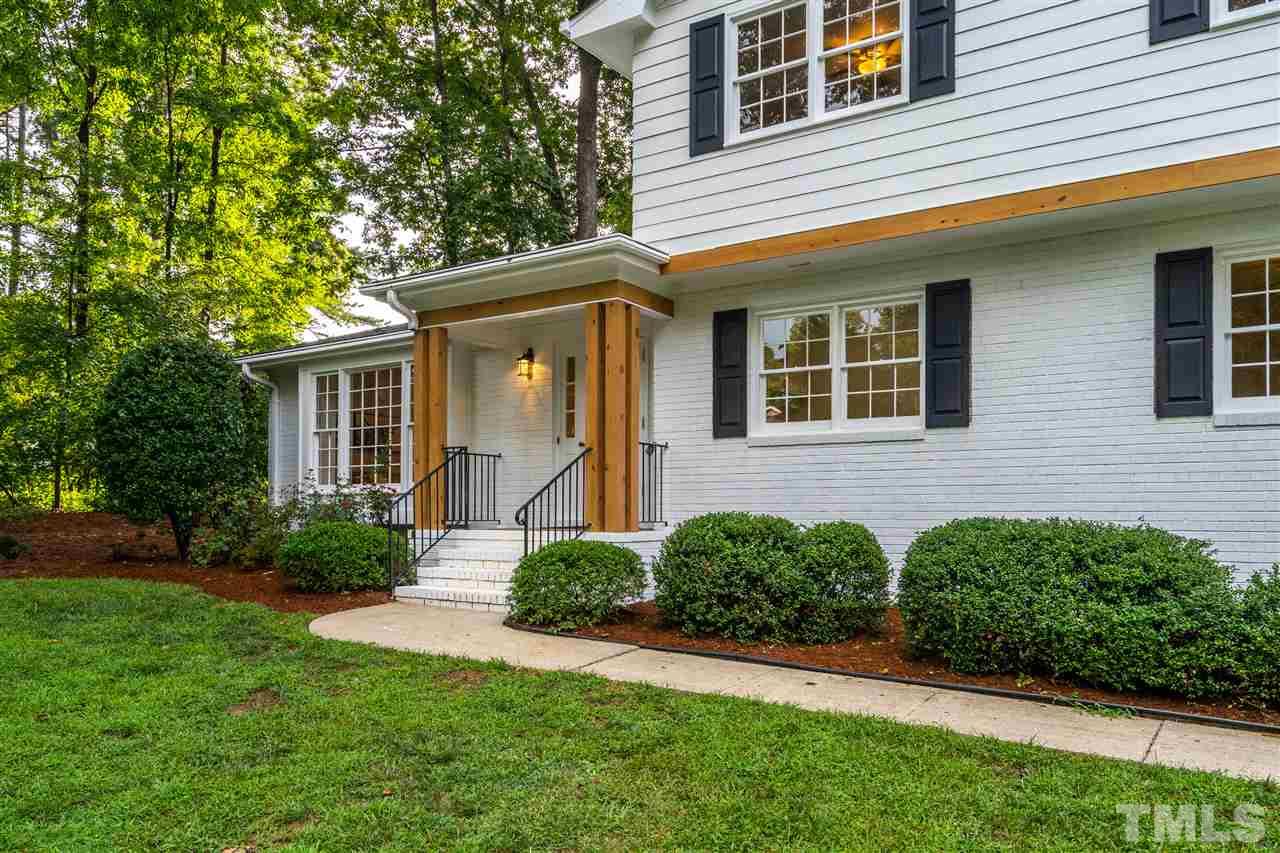 4012 Colby Drive Raleigh, NC 27609 - Photo 4 of 23 a view of a house with a yard