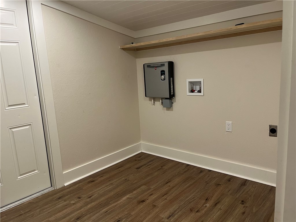 216 Hugh Street Sinton, TX 78387 - Photo 18 of 20 a view of a room with wooden floor