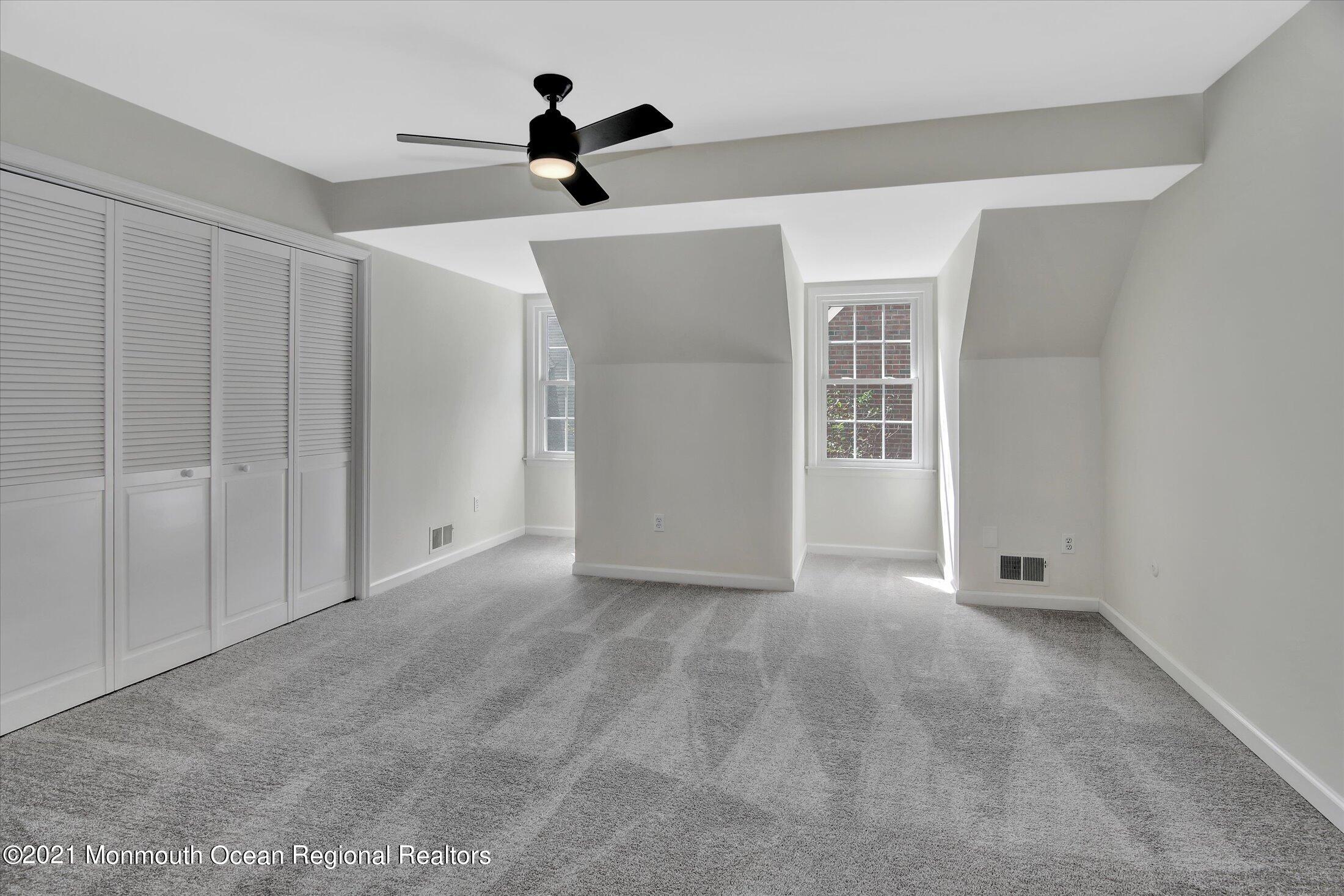 50 Wyckham Road Spring Lake Heights, NJ 07762 - Photo 12 of 27 a view of an empty room with a window