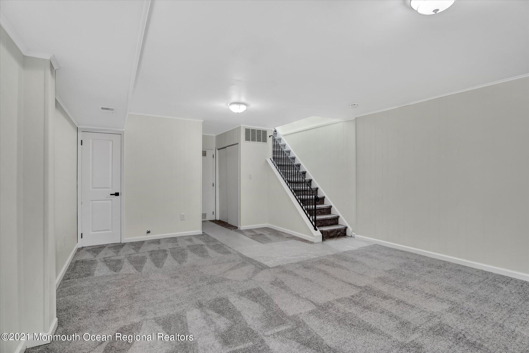50 Wyckham Road Spring Lake Heights, NJ 07762 - Photo 18 of 27 a view of an empty room with stairs
