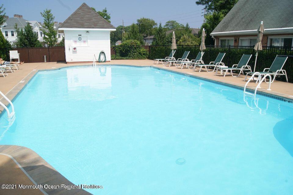 50 Wyckham Road Spring Lake Heights, NJ 07762 - Photo 22 of 27 a view of a swimming pool with a patio