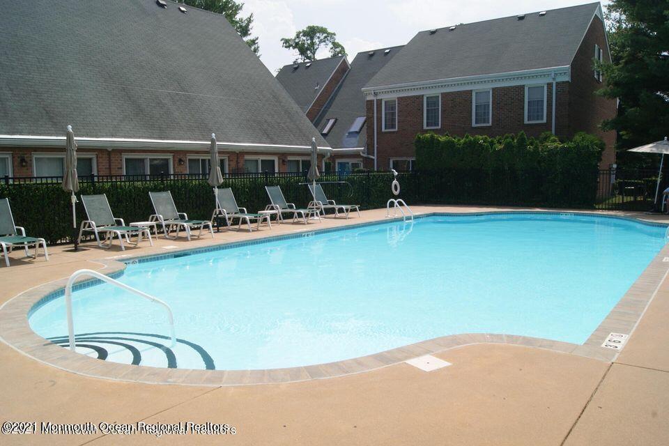 50 Wyckham Road Spring Lake Heights, NJ 07762 - Photo 23 of 27 a view of a swimming pool with a patio